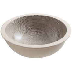 a white bowl that is sitting on a table