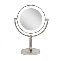 a round mirror sitting on top of a metal stand in front of a white background