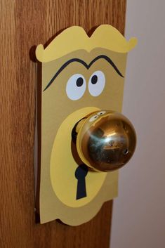 a door handle with a cartoon face on it