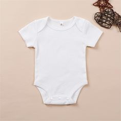 Baby Girls Short Sleeve Solid Color Romper Baby Clothing Cheap Wholesale - PrettyKid Casual Stretch Bodysuit For Playwear, Stretch Cotton Onesie For Playwear, Cute Solid Color Playwear Bodysuit, Cute Solid Color Bodysuit For Playwear, Cute Cotton Stretch Bodysuit, Cute Stretch Cotton Bodysuit, Spring Playtime Bodysuit, Stretch Cotton Onesie For Playtime, Cute Solid Color Spring Onesie