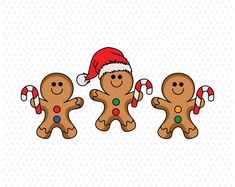 three gingerbreads with christmas hats and candy canes on their heads are standing next to each other