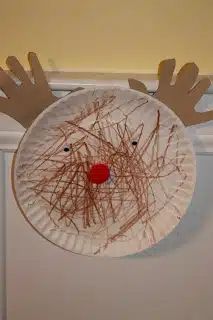 a paper plate that has been made to look like a reindeer's head