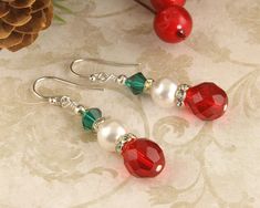 Red & Green Christmas Pearl Earrings at $21.00 #jewelry #handmade #SWCreations #fashion #handcrafted Christmas Jewelry Diy, Crystals Red, Red Green Christmas, Beaded Earrings Tutorials, Winter Jewelry, Holiday Earrings, Christmas Bead, Earrings Christmas, Jewelry Crystal