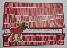 a card with a moose on it and the words heart felt holiday wishes written in red