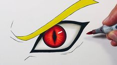 someone is drawing an eye with colored pencils on the paper and it looks like they have red eyes