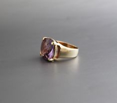 ♦♦ Beautiful handcrafted ring ◘Stone Information: Genuine Amethyst - Color: Purple Cut: Cushion Size: 15 mm ◘ Metal: 925 Sterling Silver ◘ Band: 3 mm ◘ Setting: Open back bezel setting ◘ Finish: High polish (shiny) ◘ Nickel free ◘ Anti tarnish ◘ Vermeil Gold ◘ Handmade band: 14 gauge solid sterling wire This ring is adorably rustic, easy to wear, & stackable! ◘Please Note - The Ring in the Picture can be available or Sold out. Every Ring is Made of a Unique Gemstone. Therefore, Colors and In Gold Multi-stone Amethyst Ring, Classic Gold Amethyst Multi-stone Ring, Yellow Gold Multi-stone Amethyst Ring Gift, Elegant 14k Gold Multi-stone Amethyst Ring, 14k Gold Multi-stone Amethyst Ring, Prasiolite Ring, Green Amethyst Ring, Yellow Gemstones, Amethyst Gem