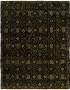 an old rug with many different designs and colors on the carpet, including squares and rectangles