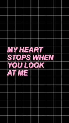 a black background with pink writing that says, my heart stops when you look at me