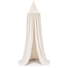 a white canopy bed on a white background