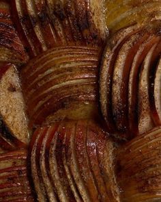 some sliced up food sitting on top of a pan