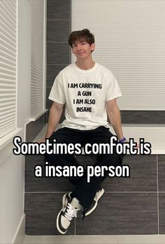 a man sitting on top of a toilet wearing a white t - shirt that says sometimes comfort is a insane person