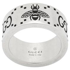 Gucci GG Sterling Silver Engraved Bee 9mm Ring YBC728304001 The historical GG motif appears alongside a favorite House symbol, the bee. The contemporary feel to the design echos the gender-fluid approach that is seen throughout the collection. The two engraved emblems feature as the defining design detail of this 9mm sterling silver ring. This item will arrive beautifully packaged in a unique Gucci presentation box. Gucci Packaging, House Symbol, Signature Ring, Signature Rings, Bee Ring, Gucci Jewelry, Contemporary Ring, Bee Design, The Bee