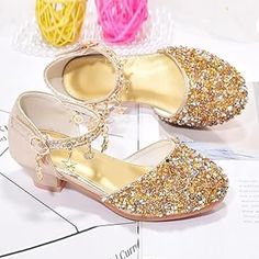 These Mary Jane shoes boast a regal design, perfect for little princesses who love to shine at parties and dances. The low heels add a touch of elegance while ensuring comfort, allowing your princess to enjoy every moment of the party or dance. Adorned with sparkling rhinestones, these Mary Jane shoes bring a touch of magic, making your princess stand out with every step. Whether it's a party, dance, or any special occasion, these shoes complement various outfits, adding a touch of charm to any Rhinestone Party, Regal Design, Party Dance, Mary Jane Heels, Jane Shoes, Mary Jane Shoes, To Shine, Little Princess, Low Heels