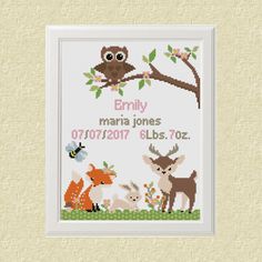 a cross stitch pattern with an owl, deer and other animals sitting on a tree branch