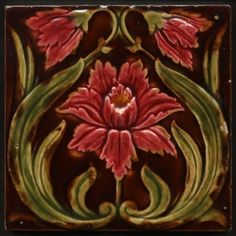 a red flower with green leaves and swirls on a brown background in a square tile