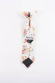 Material:Cotton Blend Approx Size: Max width: 6.5 cm / 2.4 inches 9-24 months 26 CM 2-5 years 31 CM 9-11 Years 43 CM White Cotton Ties For Gifts, Spring White Cotton Suit And Tie Accessories, Summer Floral Print White Ties, White Floral Print Ties For Summer, Summer White Floral Print Ties, White Ties For Groom In Spring, Adjustable White Suit And Tie Accessories For Groom, White Floral Print Suit And Tie Accessories For Summer, White Floral Suit And Tie Accessories For Spring