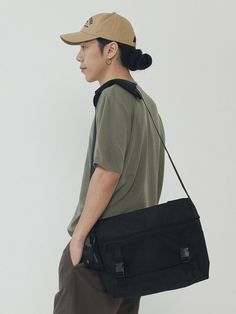 Editor's notesIt is a casual and trendy messenger bag. The bag is spacious and has buckle closure and a zip mesh pocket.- Messenger bag- Zipped mesh pocket- Spacious- Buckle closureMeasurements(in.)One Size- Width: 12.2 in.- Height: 10.6 in.- Depth: 4.3 in.*Model info: Height 5’ 11” Waist 32 in. / Fitting size: One SizeComposition & Care- 100% Polyester- Hand wash in cold waterDesigner- by ANALOGMOOD Casual Laptop Shoulder Bag With Zipper Pocket, Casual Rectangular Briefcase With Zipper Pocket, Casual Black Laptop Bag With Zipper Pocket, Casual Shoulder Bag With Zipper Pocket And Flap, Casual Flap Shoulder Bag With Zipper Pocket, Casual Rectangular Briefcase With Adjustable Strap, Casual Black Laptop Bag With Pockets, Casual Satchel Briefcase, Casual Nylon Rectangular Satchel