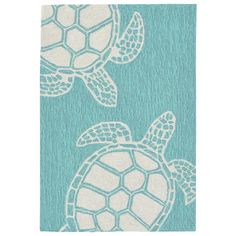 a blue rug with two sea turtles on it