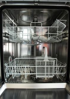 an empty dishwasher with the door open