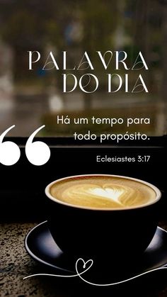 a cup of coffee sitting on top of a table next to a window with the words palavra do dia