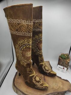 There is handembroidery custom made western style knee high boots. Made with genuine leather, handembroidery suzani velvet, ykk zipper, kitten heel. There is every size is available 6 us to 11 us, 36 eu to 43 eu. For to make custom boots and shoes NO extra charging İf you need wider calf please send us your calf circle measurments. Boots style is kitten heel. Waterproof, very confortable custom made boots. We have door to door shipping service to all over the world. Accepted payment, PayPal, Sho Traditional Fitted Snip Toe Boots, Traditional Fitted Boots For Fall, Brown Bohemian Embroidered Boots, Fitted Bohemian Winter Boots, Traditional Boots For Festival, Handmade Traditional Brown Boots, Traditional Handmade Brown Boots, Traditional Fitted Boots For Festival, Kitten Heel Boots