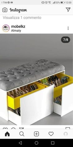 a white bench with yellow drawers on it and an instagram button below the seat