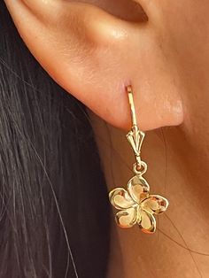 Elegant And Beautiful Hawaiian 14Kt Solid Yellow Gold 12mm Plumeria Flower Lever Back Dangle & Drop Earrings Plumeria Flower Sandblast with a High Polished Edge 14 Karat Solid Yellow Gold GUARANTEED, Authenticated with a 14K Stamp Made With Highest Quality Craftsmanship Solid 14K Yellow Gold Plumeria Flower Lever Back Dangle & Drop Earrings Total Weight 1.9 grams Solid 14K Yellow Gold Plumeria Flower Width 12 Millimeters Length 12 Millimeters Drop Length 28 Millimeters Amazing Gift For Family An Yellow Gold Flower-shaped Jewelry With Ear Wire, Yellow Gold Flower Charm Drop Earrings, Dream Jewelry, Pretty Jewellery, Cute Earrings, Solid Yellow, Gifts For Family, Armoire, Dangle Drop Earrings