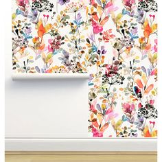 wallpaper with watercolor flowers and leaves on white background, in an empty room