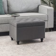 a living room scene with focus on the footstool