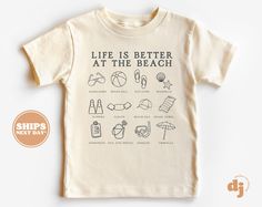 Toddler T-shirt - Life is Better at the Beach Kids Retro TShirt - Retro Natural Infant, Toddler & Youth Tee  All of the shirts and bodysuits at our shop are CPSIA compliant. We only use Eco-friendly, water-based inks that are also CPSIA compliant and boasts strong washability (highest score on AATCC wash test).  So rest assure to put them on your little ones!  ** COLOR OF T-SHIRTS WILL VARY SLIGHTLY DUE TO LIGHTING AND/OR MONITOR SETTINGS ** DETAILS OF BABY BODYSUITS & T-SHIRTS MAY VARY SLIGHTLY Toddler Beach, Beach Sunglasses, Beach Kids, Beach Shirts, Retro Tshirt, Product Photos, Kids Tops, Shirt Color, At The Beach