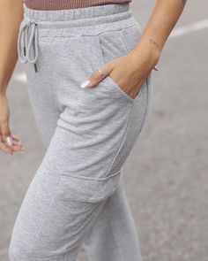 Grey Straight Leg Cargo Sweatpants We didn’t invent the grey sweatpant - we just made it better! Soft, stretchy, and irresistibly comfy, the new Signature Soft Straight Leg Cargo Sweatpants keep you perfectly cozy this season and beyond! These grey sweatpants feature your favorite not-too-thick Signature Soft fabric for that gotta-have-it soft feel you love with trendy cargo pocket styling! Why you’ll love it: Our famously cozy, stretchy, Signature Soft material in a straight leg mid-heathered g Gray Stretch Joggers With Elastic Waistband, Gray Stretch Sweatpants With Side Pockets, Gray Stretch Sweatpants With Ribbed Waistband, Gray Stretch Sweatpants For Leisure, Gray Joggers With Elastic Waistband, Stretch Gray Sweatpants For Leisure, Gray Leisure Joggers, Gray Stretch Sweatpants With Elastic Waistband, Comfortable Stretch Gray Sweatpants