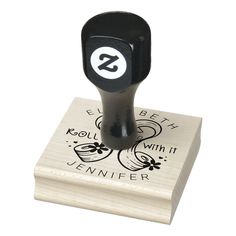 a rubber stamp with the letter s on it