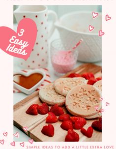 valentine's day breakfast with pancakes and strawberries on a cutting board next to a cup of tea