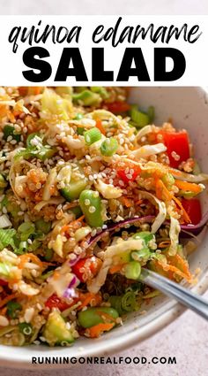 a white bowl filled with quinoa edamame salad on top of a table