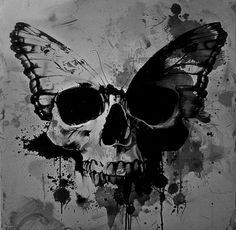 a black and white photo with a butterfly on it's face, in the shape of a skull