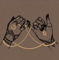 two hands holding each other in the air with stars and crescents on their fingers