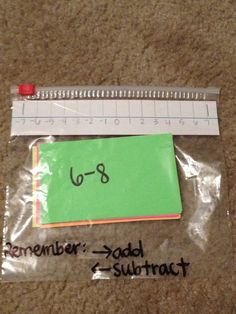 a piece of paper that has been taped to a ruler with the word, remember's - sadd subtract written on it