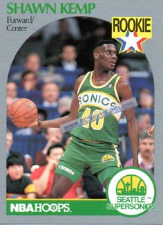 a basketball card with a man in green jersey holding a basketball on it's finger