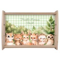 a wooden tray with an animal family on it