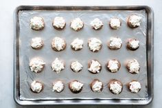 there are many small cupcakes on the baking sheet ready to go into the oven