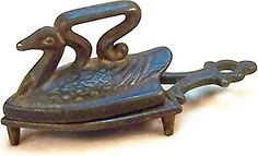 a metal object with two birds on it