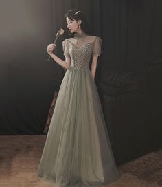 Homecoming Tulle Evening Dress With Sweep Train, Elegant Tulle Fabric For Prom Season And Debutante Ball, Elegant Tulle Fabric For Debutante Ball And Prom Season, Embellished Tulle Gown For Homecoming, Tulle Fabric For Debutante Ball And Prom Season, Embroidered Tulle Gown For Homecoming, Elegant Tulle Fabric For Prom Season, Floor-length Evening Dress With Tulle Skirt For Prom, Elegant Floor-length Tulle Fabric For Prom