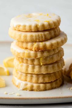 a stack of lemon shortbread cookies on a plate