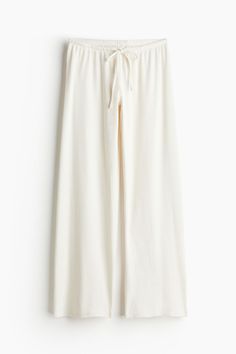 Relaxed-fit  wide-cut pants in ribbed jersey. Low waist  narrow drawstring  and covered elastic at waistband. Cute White Pants, Wide Leg Sweat Pants, Jersey Trousers, White Wide Leg Pants, Wide Leg Lounge Pants, Cute Pants, Jersey Pants, Cardigan Sweater Jacket, Kids Outerwear