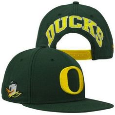 a green and yellow hat with the word ducks on it