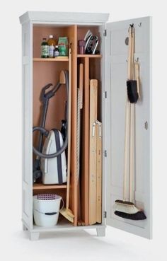 an open cabinet with tools and cleaning supplies in it on a white background for display