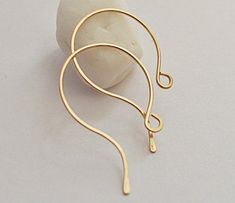 Choose quality gold filled ear wires for fancy earrings making! The French hoop ear wires are carefully handcrafted by me. These are quality and beautiful earrings components. There is a little loop at the end for additional components attaching. This makes them great for beading projects. Attach lovely beads and make unusual artisan earrings! Please consider different supplies I offer to complement your jewelry projects! Details: Length - 1 inch (25mm) Diameter 17mm 14k Gold Filled wire 20 gaug Minimalist Hoop Earrings With French Hook, Hoop Earrings With French Hook For Gift, Earrings Making, Fancy Earrings, Artisan Earrings, Earrings Hoop, Beading Projects, Gold Filled Earrings, Earrings Unique