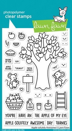 a clear stamp with an image of a tree and some other things in the background