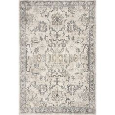 an area rug with grey and white colors