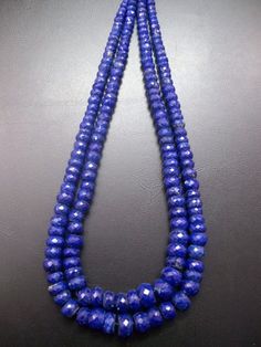 GEMSTONE NAME :- NATURAL LAPIS LAZULI FACETED GEMSTONESHAPE :- ROUNDELSIZE :- 5 MM - 7 MMLENGTH:-  8 INCH, 16 INCHQUALITY :- AAAFACETED BEADSCOLOR ;- DARK BLUEWE DEAL IN GOOD QUALITY.This listing is one strand for NATURAL LAPIS LAZULI faceted beads, beautiful Beads,The beads have beautiful color about 8 INCH, 16 INCH in length.More beautiful than picture!Please see the photographs to see more detail. The overall quality is excellent for the price!You will receive one full strand.These AAA Grade Gem Stones, Shop Small, Faceted Gemstones, Etsy Jewelry, Faceted Bead, Ethiopian Opal, Support Small, Lapis Lazuli, Etsy Finds